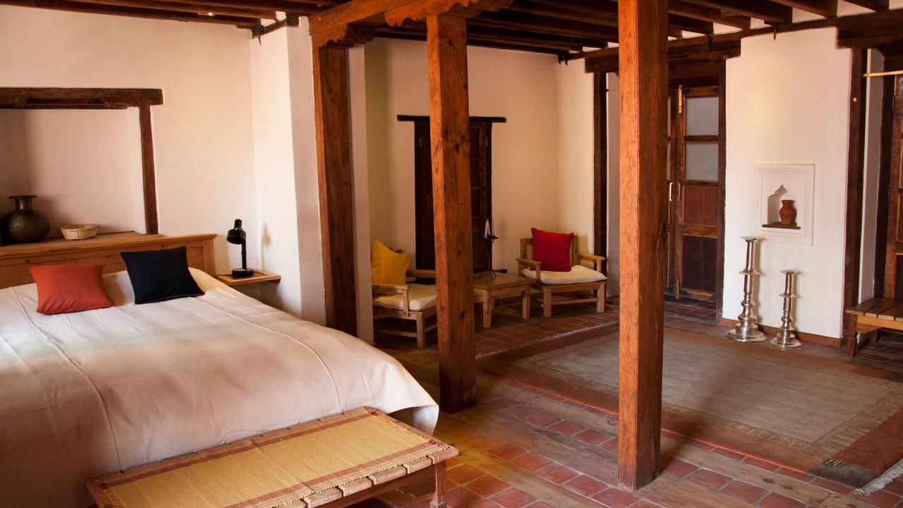 Bedroom with seating area at Inn Patan