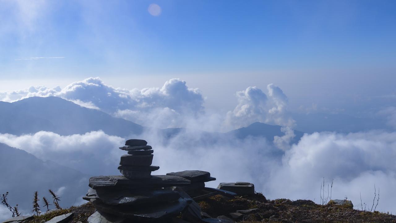 Stone stack looking out over the clouds