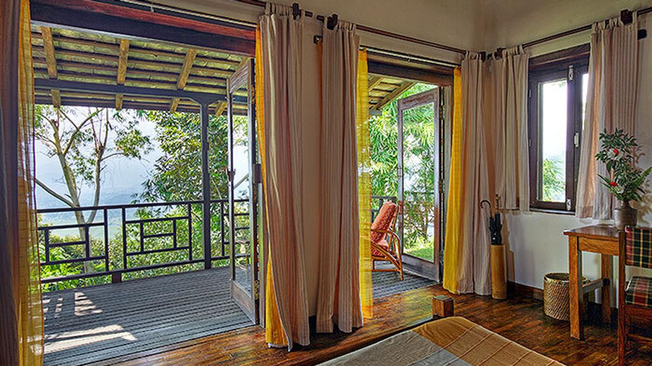 Room with veranda overlooking forest