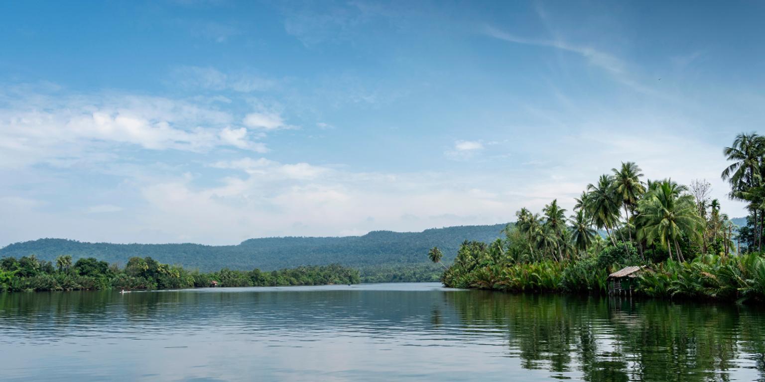 River with Cardamom Mountains in distance