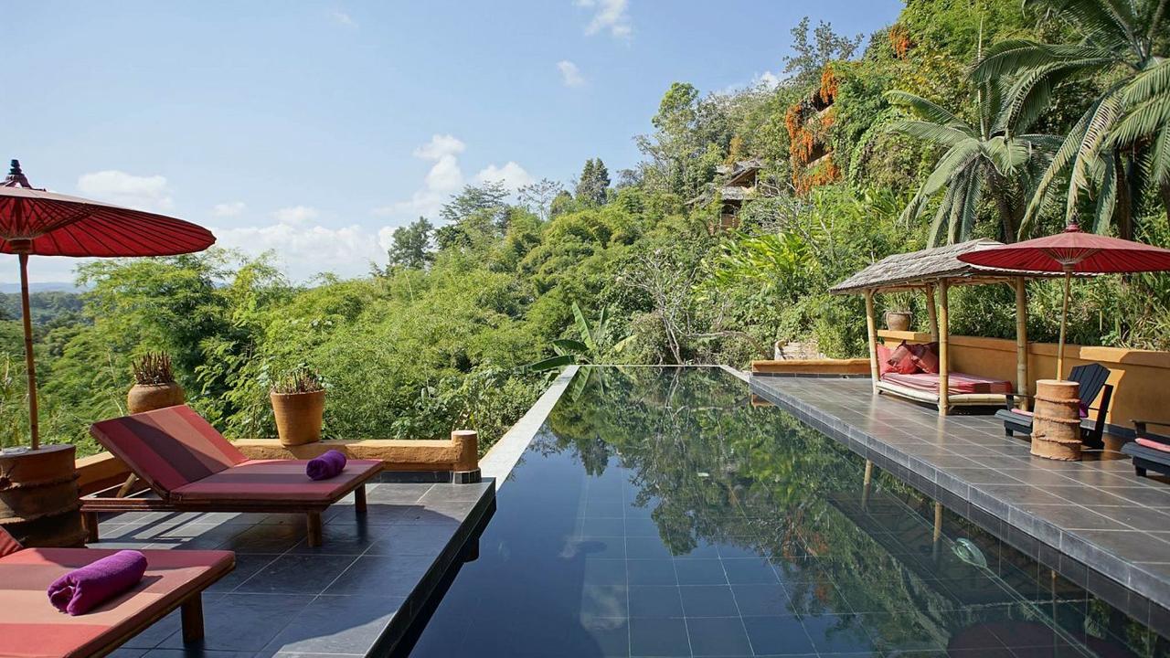 Infinity pool with mountain views