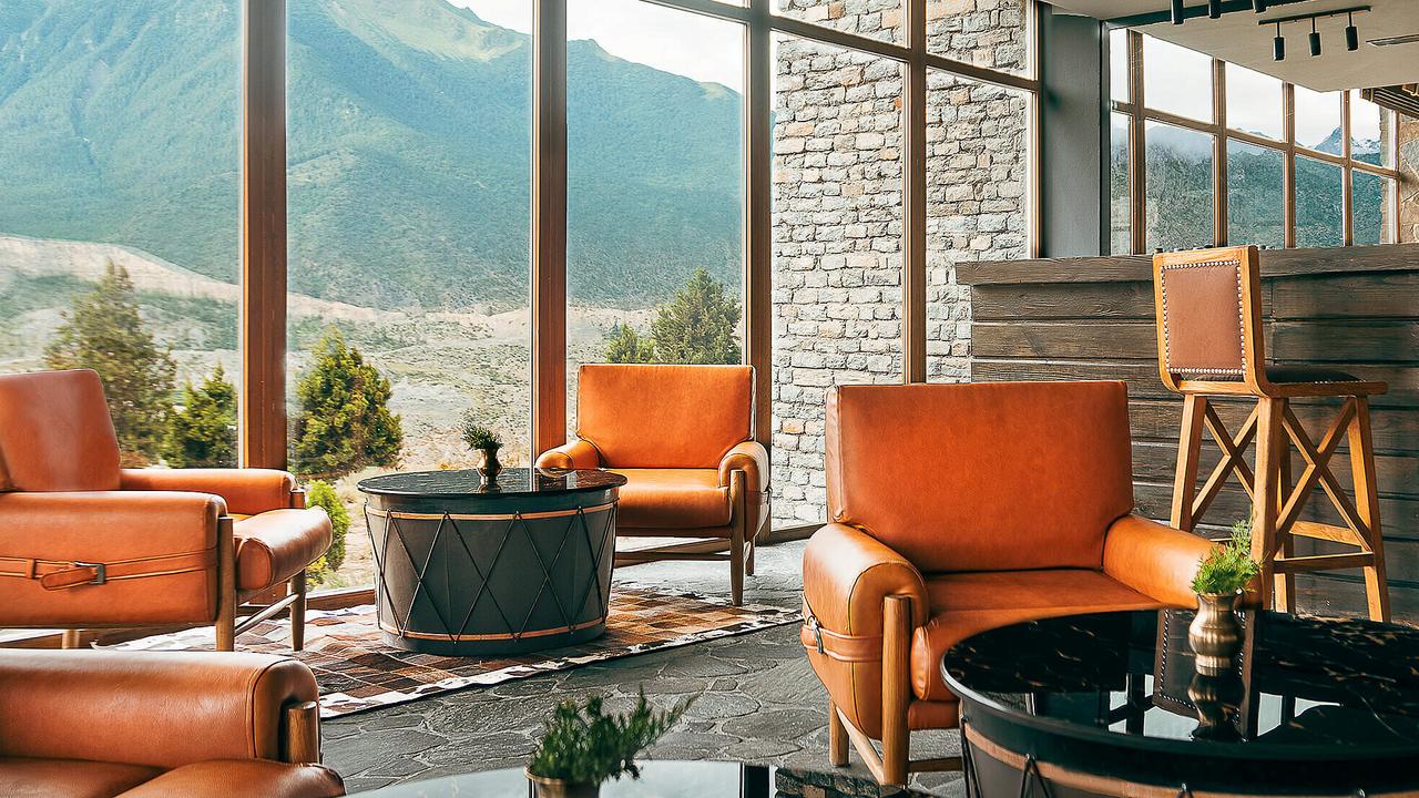 Cosy armchairs with a mountain backdrop