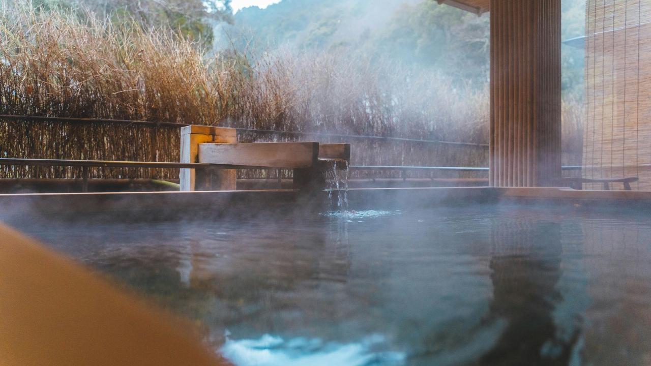 Outdoor onsen hot spring bath in Japan. Selective Asia.