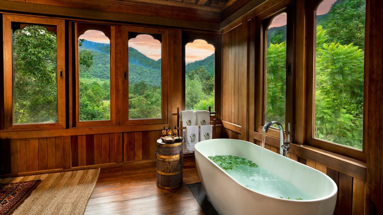 Bathroom with forest views at and Beyond Punakha River Lodge